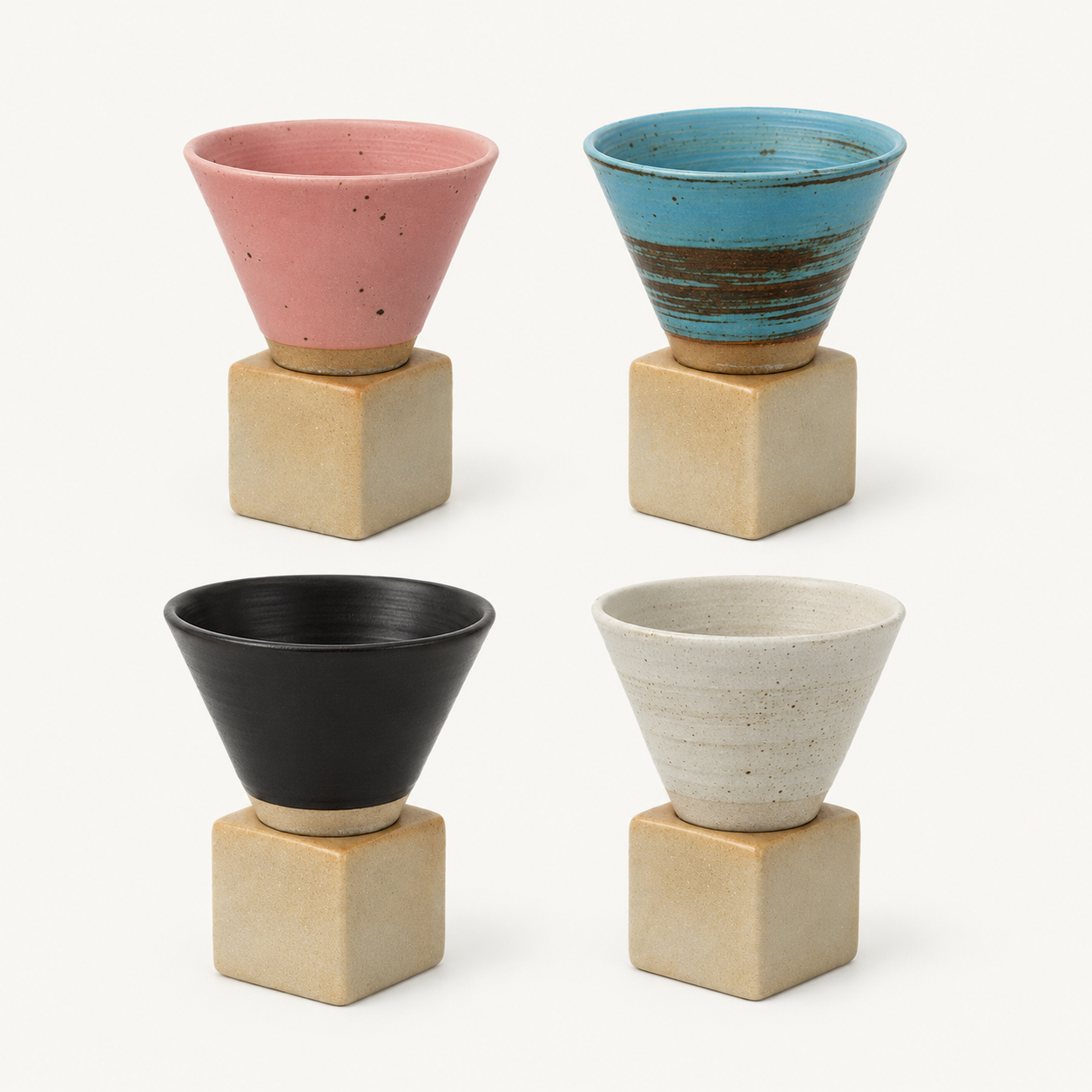 Four vintage stoneware espresso cups with bases